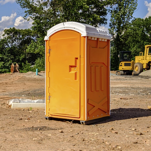 what is the cost difference between standard and deluxe porta potty rentals in Goshen